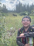 In the field collecting soil samples